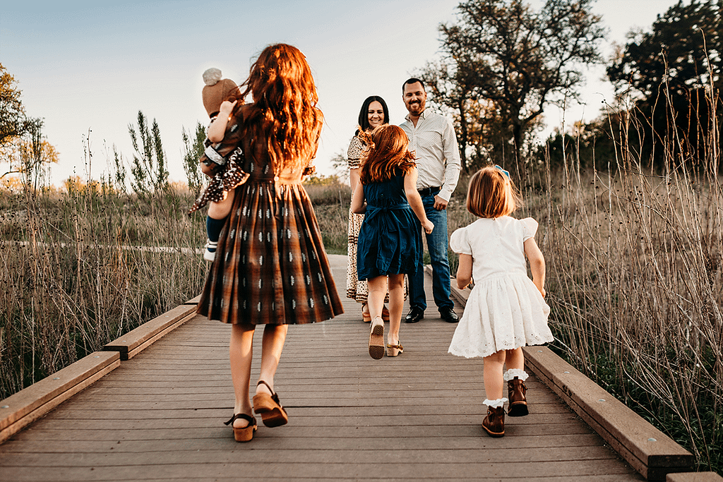 family on a boardwalk